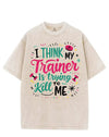 I THINK MY TRAINER IS TRYING TO KILL ME VINTAGE GYM SHIRT