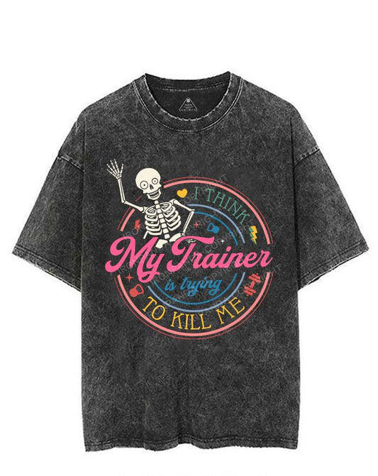 I THINK MY TRAINER IS TRYING TO KILL ME VINTAGE GYM SHIRT