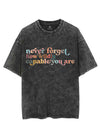 NEVER FORGET HOW WILDLY CAPABLE YOU ARE VINTAGE GYM SHIRT